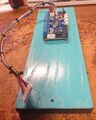 Attach the Fighting board to the side.